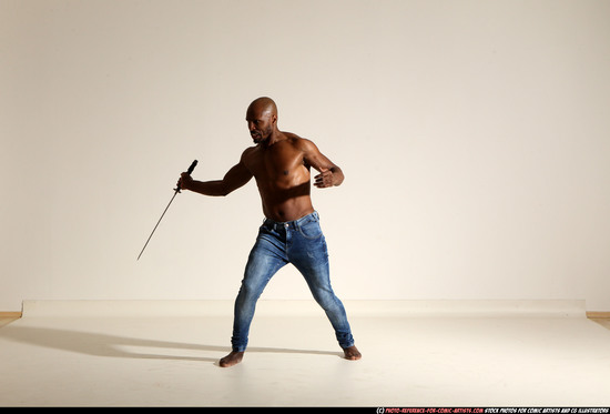 Man Adult Athletic Black Fighting with sword Moving poses Pants