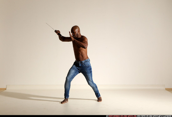 Man Adult Athletic Black Fighting with sword Moving poses Pants