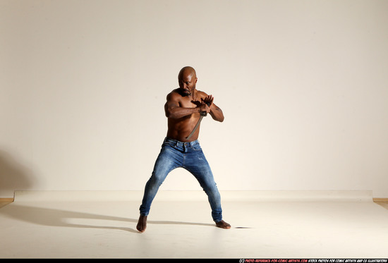 Man Adult Athletic Black Fighting with sword Moving poses Pants