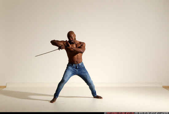 Man Adult Athletic Black Fighting with sword Moving poses Pants