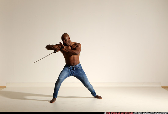 Man Adult Athletic Black Fighting with sword Moving poses Pants