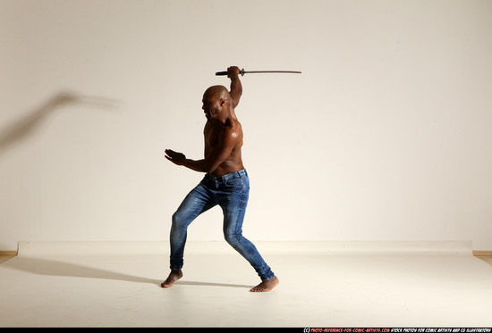 Man Adult Athletic Black Fighting with sword Moving poses Pants