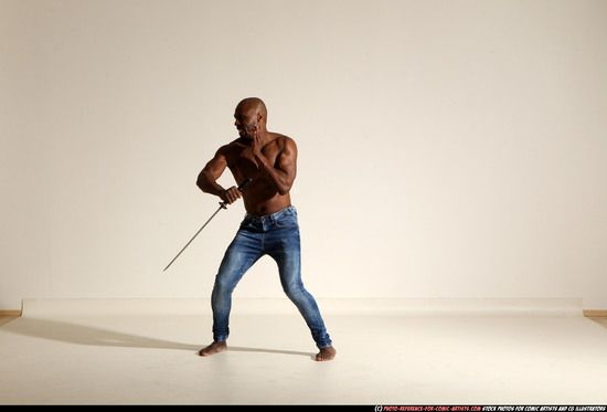 Man Adult Athletic Black Fighting with sword Moving poses Pants