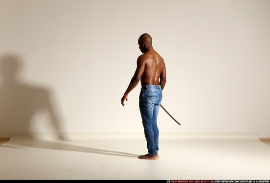 Man Adult Athletic Black Fighting with sword Moving poses Pants