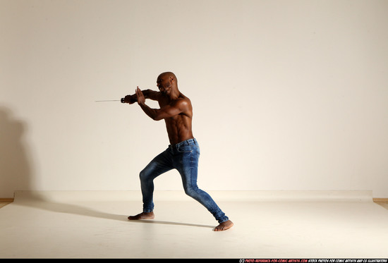 Man Adult Athletic Black Fighting with sword Moving poses Pants