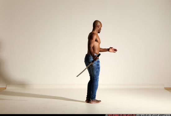 Man Adult Athletic Black Fighting with sword Moving poses Pants