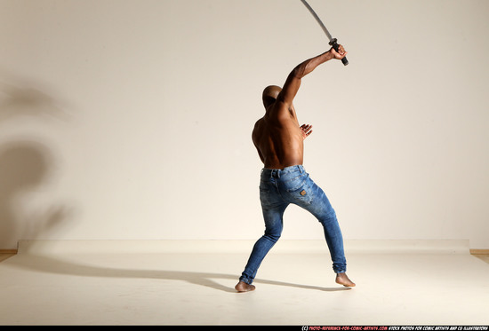 Man Adult Athletic Black Fighting with sword Moving poses Pants