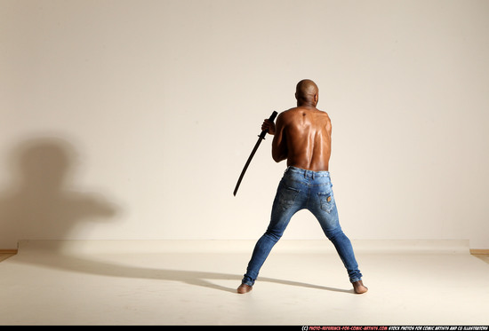 Man Adult Athletic Black Fighting with sword Moving poses Pants