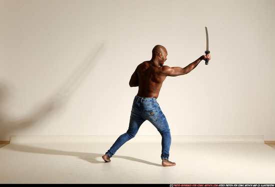 Man Adult Athletic Black Fighting with sword Moving poses Pants