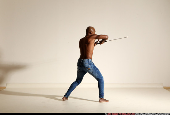 Man Adult Athletic Black Fighting with sword Moving poses Pants