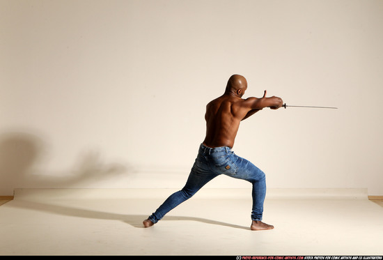 Man Adult Athletic Black Fighting with sword Moving poses Pants