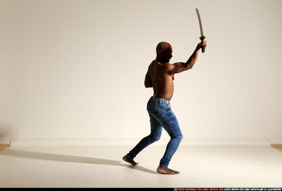 Man Adult Athletic Black Fighting with sword Moving poses Pants