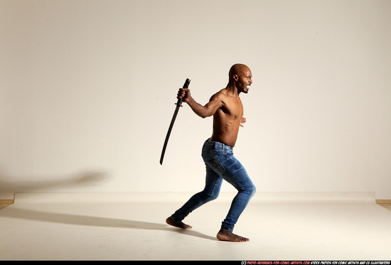 Man Adult Athletic Black Fighting with sword Moving poses Pants