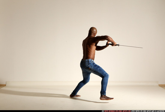 Man Adult Athletic Black Fighting with sword Moving poses Pants