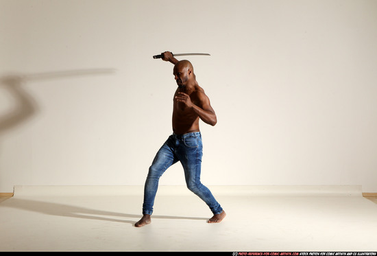 Man Adult Athletic Black Fighting with sword Moving poses Pants