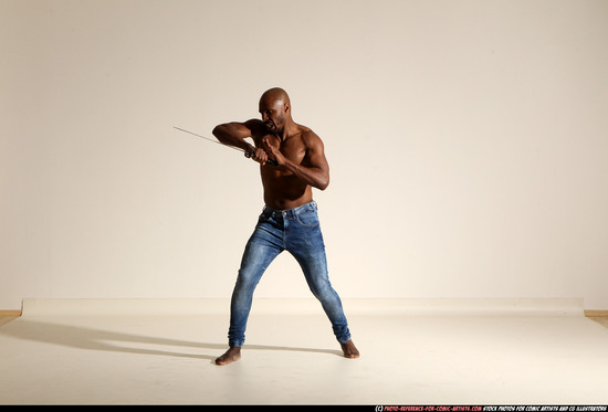 Man Adult Athletic Black Fighting with sword Moving poses Pants