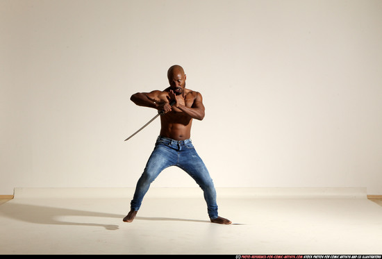 Man Adult Athletic Black Fighting with sword Moving poses Pants