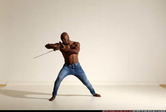 Man Adult Athletic Black Fighting with sword Moving poses Pants