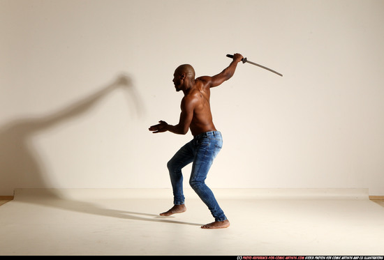 Man Adult Athletic Black Fighting with sword Moving poses Pants