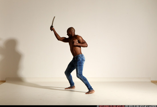 Man Adult Athletic Black Fighting with sword Moving poses Pants