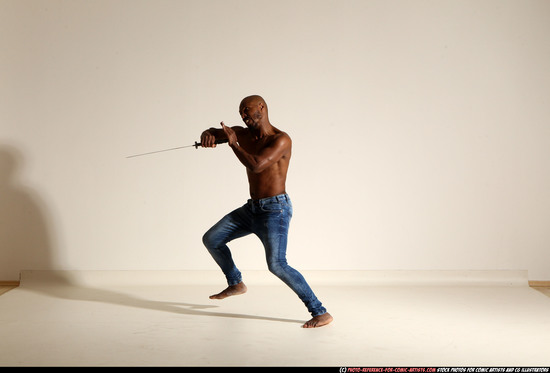 Man Adult Athletic Black Fighting with sword Moving poses Pants