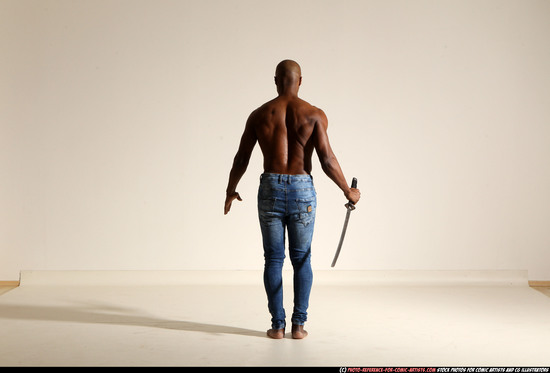 Man Adult Athletic Black Fighting with sword Moving poses Pants