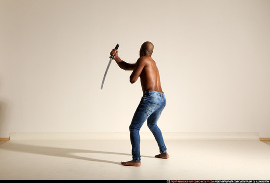 Man Adult Athletic Black Fighting with sword Moving poses Pants