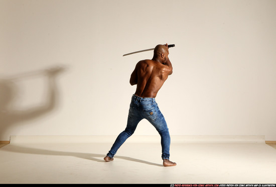 Man Adult Athletic Black Fighting with sword Moving poses Pants