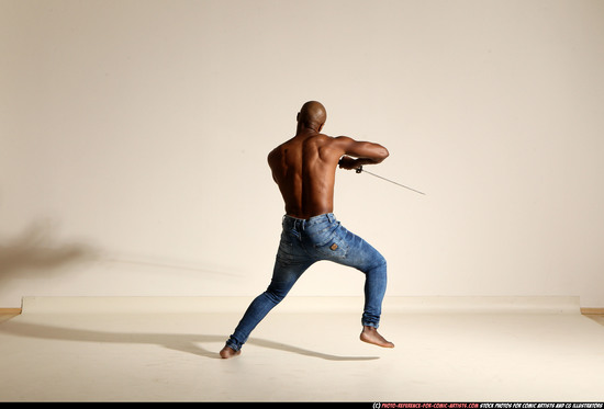 Man Adult Athletic Black Fighting with sword Moving poses Pants