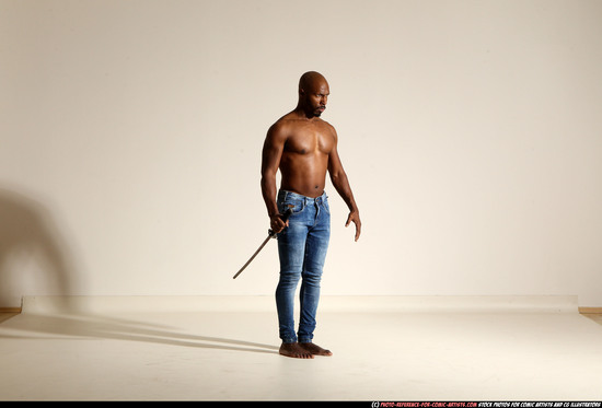 Man Adult Athletic Black Fighting with sword Moving poses Pants