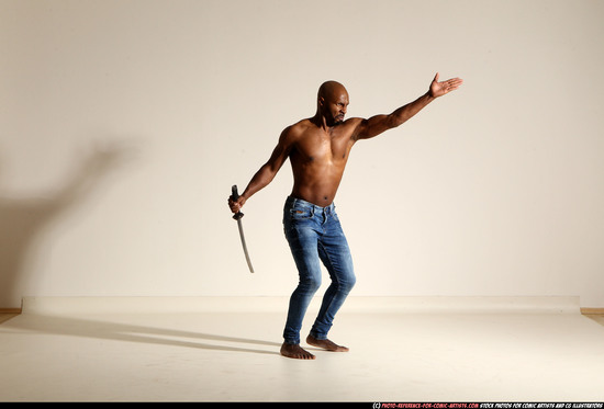 Man Adult Athletic Black Fighting with sword Moving poses Pants