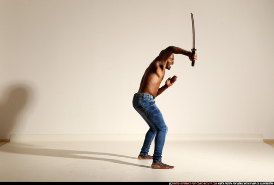 Man Adult Athletic Black Fighting with sword Moving poses Pants