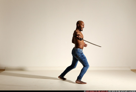 Man Adult Athletic Black Fighting with sword Moving poses Pants