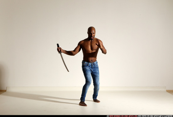 Man Adult Athletic Black Fighting with sword Moving poses Pants