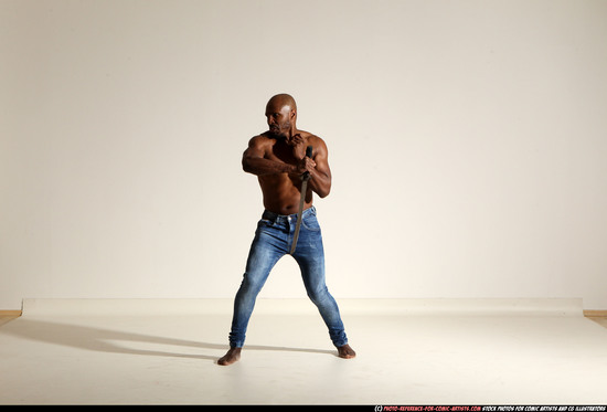 Man Adult Athletic Black Fighting with sword Moving poses Pants