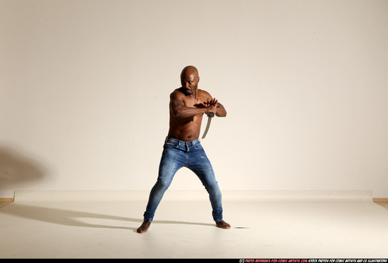 Man Adult Athletic Black Fighting with sword Moving poses Pants