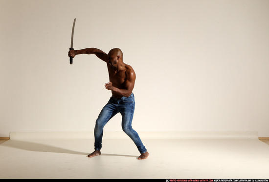 Man Adult Athletic Black Fighting with sword Moving poses Pants