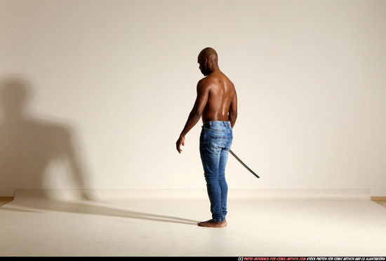 Man Adult Athletic Black Fighting with sword Moving poses Pants