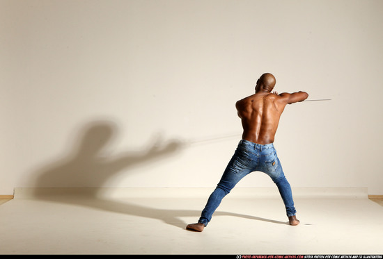 Man Adult Athletic Black Fighting with sword Moving poses Pants