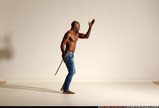 Man Adult Athletic Black Fighting with sword Moving poses Pants