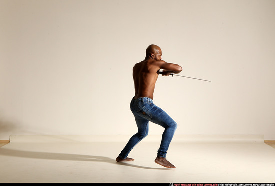 Man Adult Athletic Black Fighting with sword Moving poses Pants