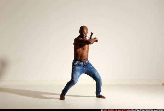 Man Adult Athletic Black Fighting with sword Moving poses Pants