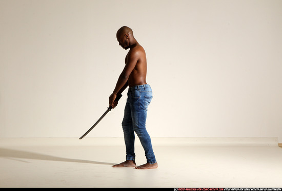 Man Adult Athletic Black Fighting with sword Moving poses Pants