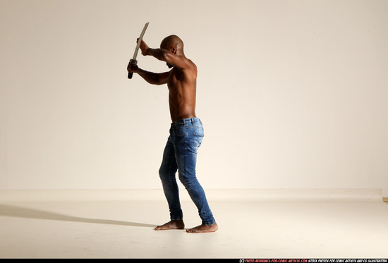 Man Adult Athletic Black Fighting with sword Moving poses Pants