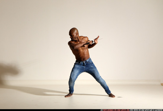 Man Adult Athletic Black Fighting with sword Moving poses Pants