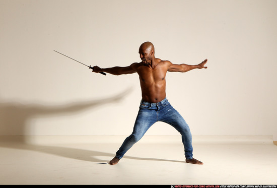 Man Adult Athletic Black Fighting with sword Moving poses Pants