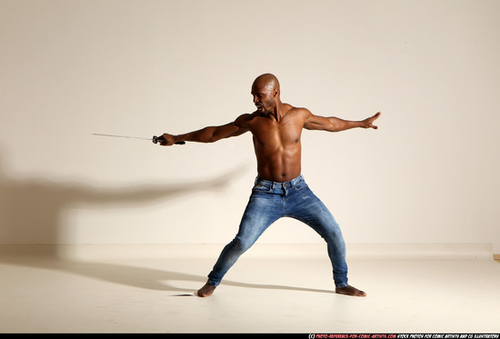 Man Adult Athletic Black Fighting with sword Moving poses Pants