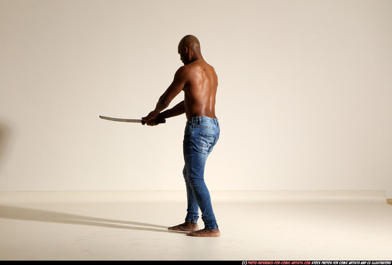 Man Adult Athletic Black Fighting with sword Moving poses Pants