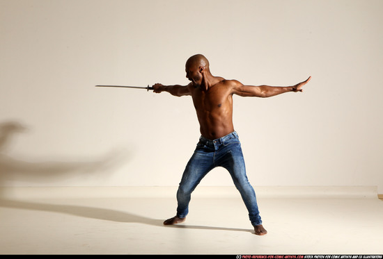 Man Adult Athletic Black Fighting with sword Moving poses Pants