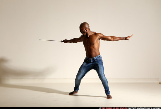 Man Adult Athletic Black Fighting with sword Moving poses Pants